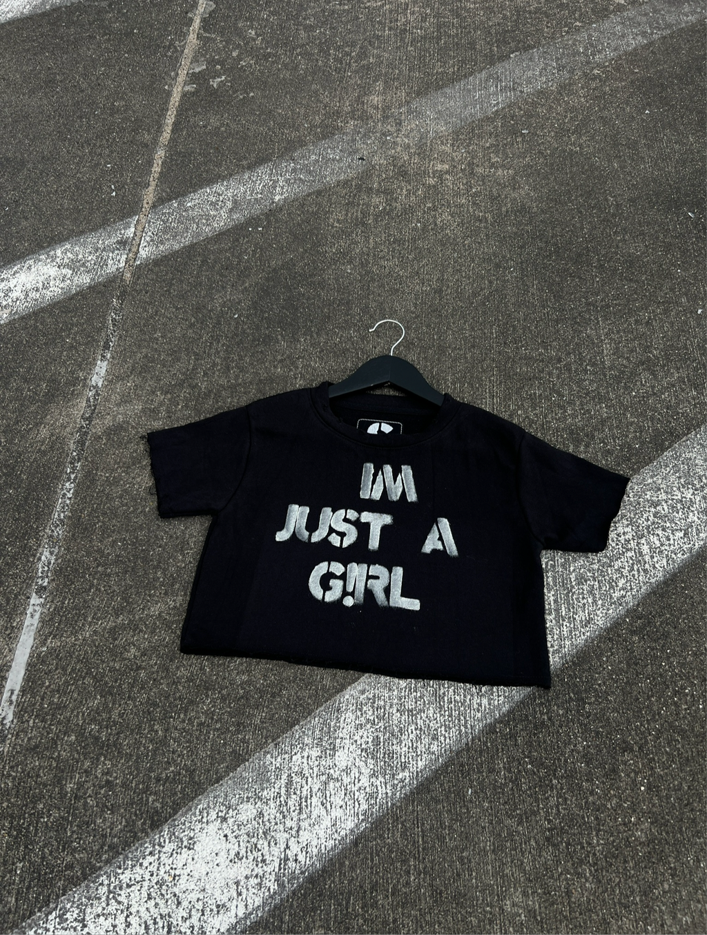 AC “IM JUST A G!RL” CROPPED TEE